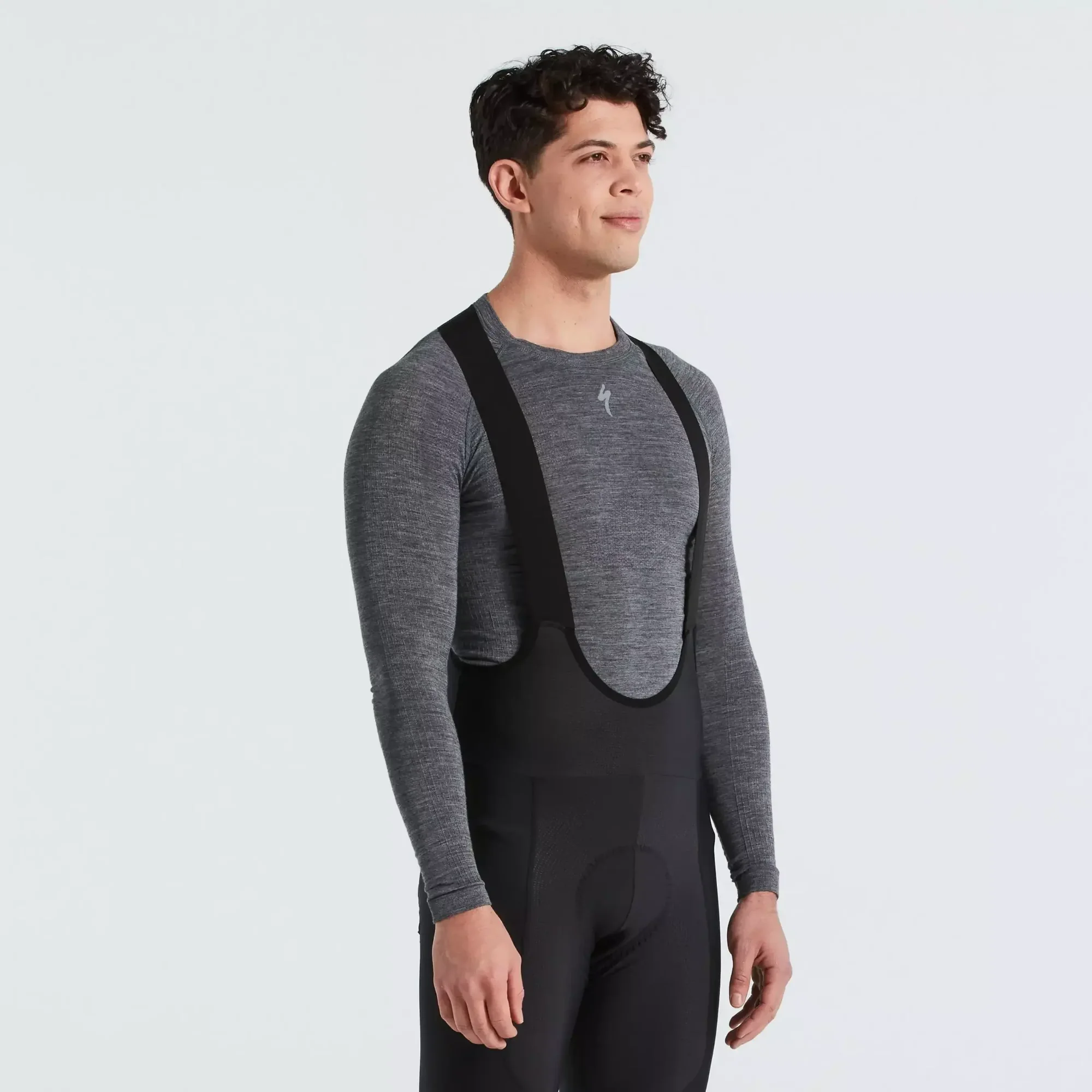 64122-050_APP_SEAMLESS-MERINO-BASELAYER-LS-MEN-GRY-S-M_FRONT-3-4 men's merino seamless long sleeve base layer