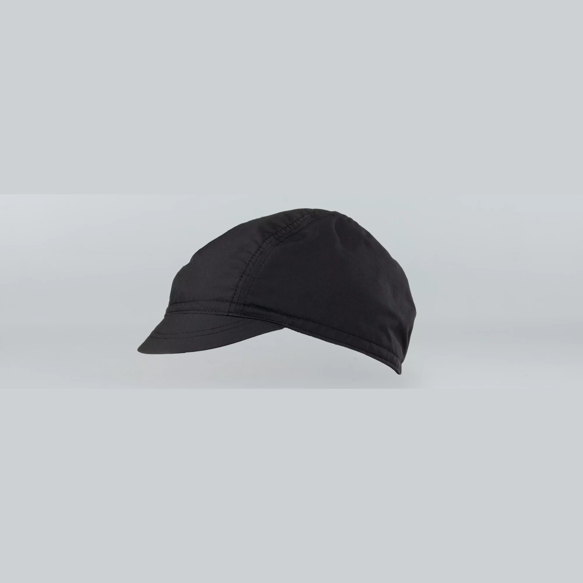 64820-100_APP_DEFLECT-UV-CYCLING-CAP-BLK-S-M_HERO deflect™ uv cycling cap